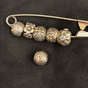 6-925 Sterling Silver with gold accents and blue topaz Floral beads.
